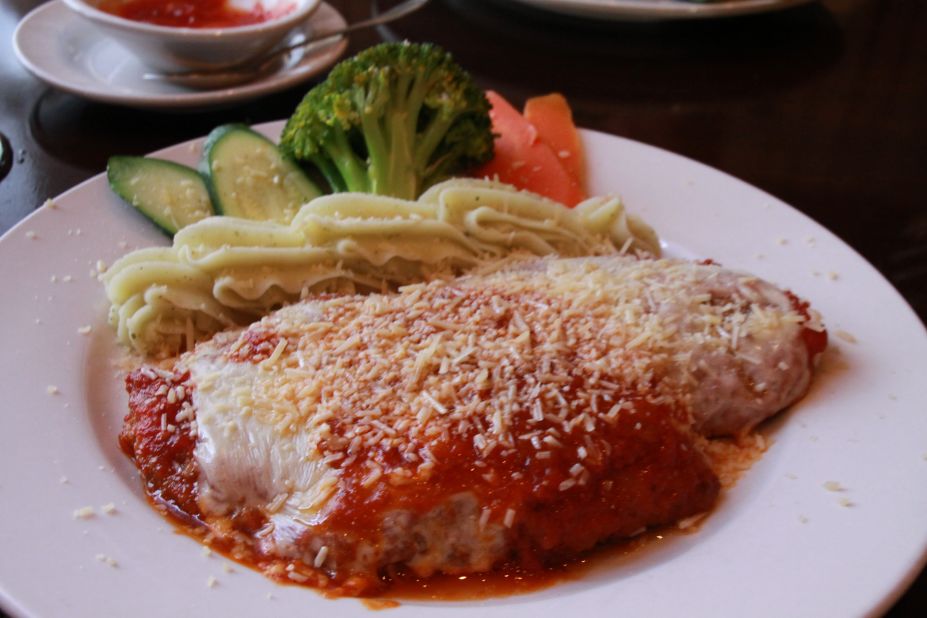 <strong>Chicken parm, Australia</strong>: Australian pubs have made this Italian dish their own -- the combination of melted Parmesan and tomato on chicken fillet is irresistible.  