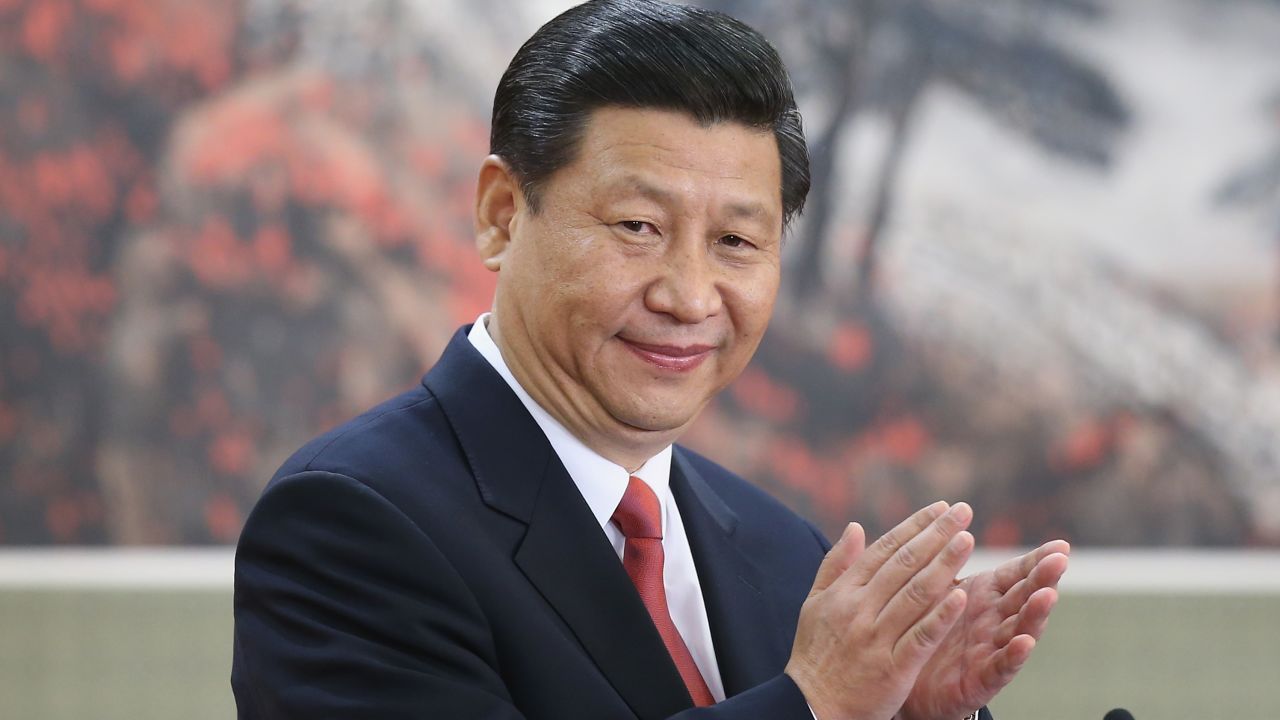 BEIJING, CHINA - NOVEMBER 15:  Chinese Vice President Xi Jinping, one of the members of new seven-seat Politburo Standing Committee, greets the media at the Great Hall of the People on November 15, 2012 in Beijing, China. China's ruling Communist Party today revealed the new Politburo Standing Committee after its 18th congress.  (Photo by Feng Li/Getty Images)