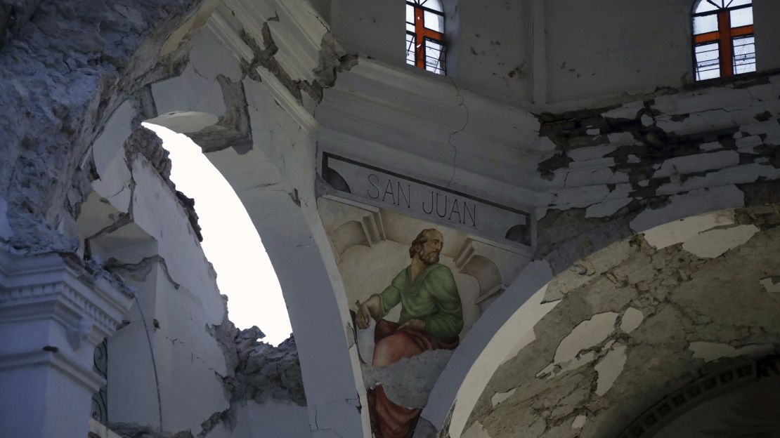 The quake left gaping holes in what's left of the church.