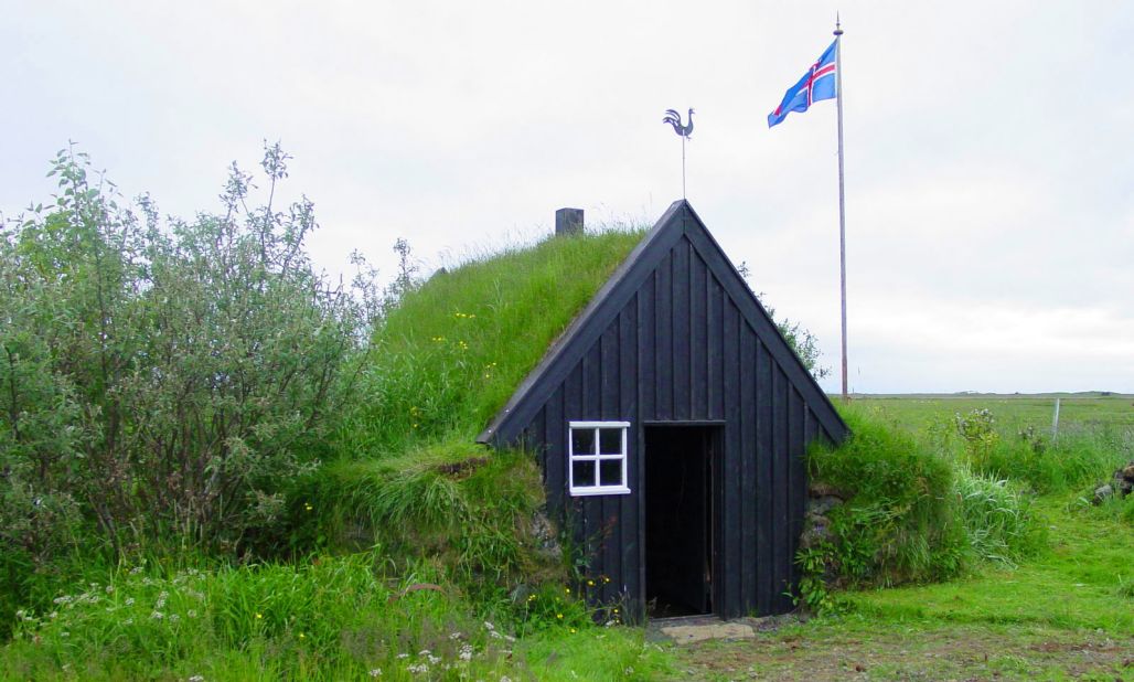 As Iceland urbanized, turf structures became less common. Pictured is a turf house that has survived modernization in Iceland.