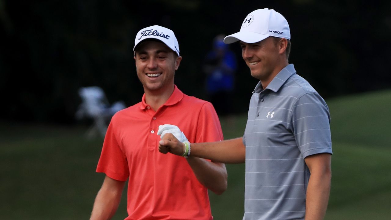 HONOLULU, HI - JANUARY 12:  Justin Thomas of the United States is congratulated by Jordan Spieth of the United States after chipping in on the tenth hole during the first round of the Sony Open In Hawaii at Waialae Country Club on January 12, 2017 in Honolulu, Hawaii.  (Photo by Sam Greenwood/Getty Images)
