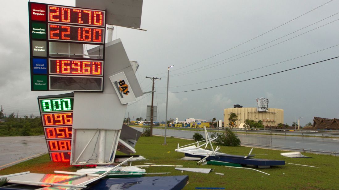 A gas station's sign is damaged in Punta Cana, Dominican Republic, as the hurricane passed just north of the country on September 21.