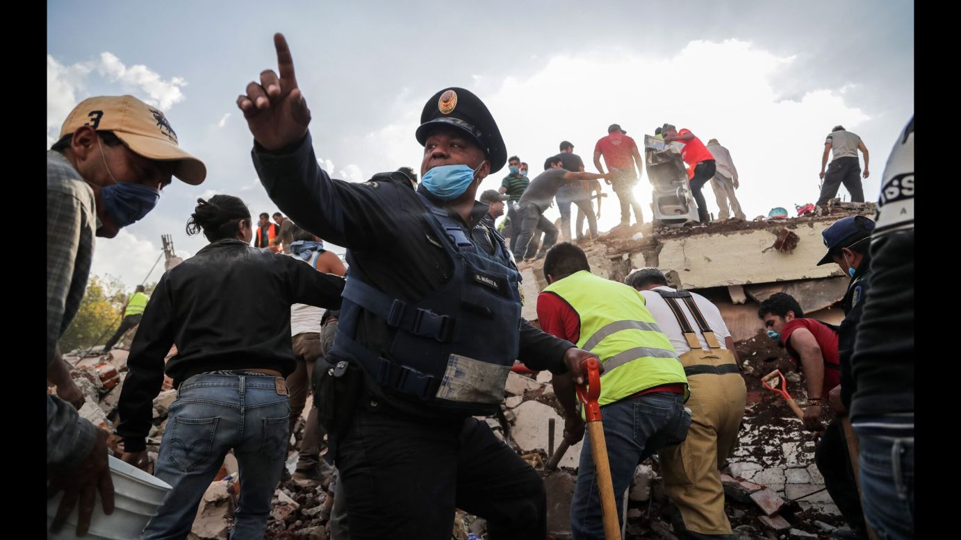 Rescue efforts take place at the site of a collapsed building in Mexico City on Tuesday, September 19. A magnitude 7.1 earthquake <a href="http://www.cnn.com/interactive/2017/09/world/mexico-quake-cnnphotos/" target="_blank">rocked central Mexico,</a> leveling many buildings and killing at least 250 people.