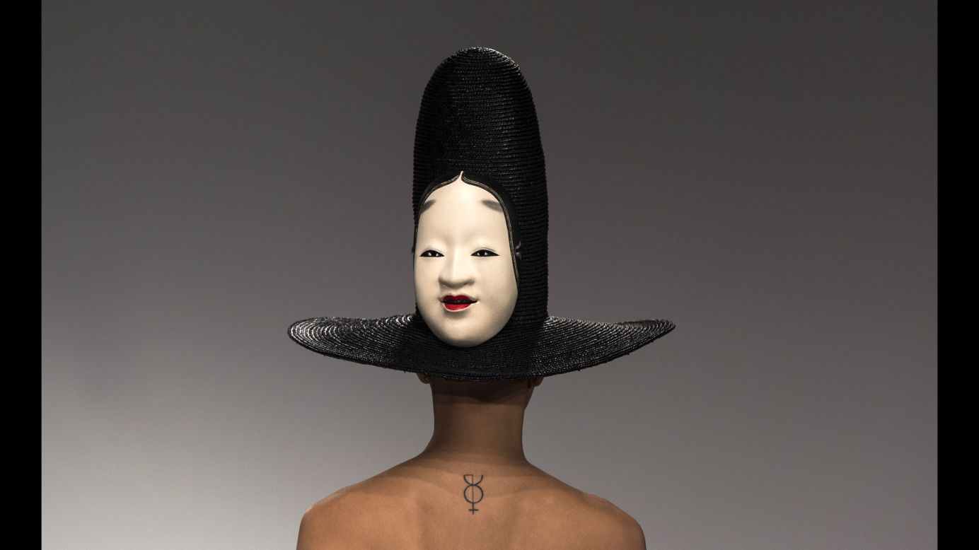 A model wears a hat designed by the A.W.A.K.E. label during London Fashion Week on Tuesday, September 19.