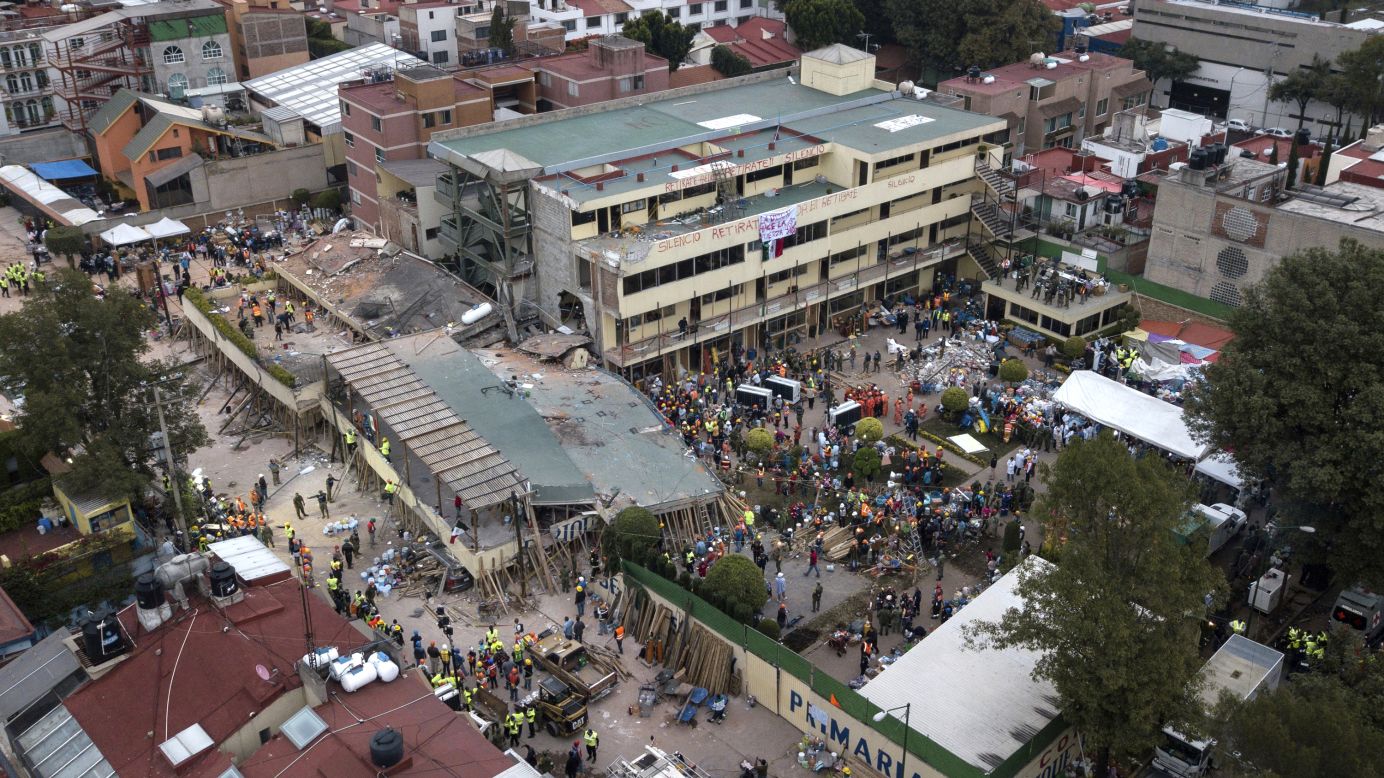 Volunteers and rescue workers search for people<a href="http://www.cnn.com/2017/09/20/world/enrique-rebsamen-school-mexico-earthquake-trnd/index.html" target="_blank"> trapped inside a Mexico City elementary school</a> on Wednesday, September 20. The school collapsed in an earthquake the day before.