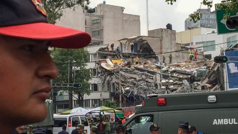 A global group of volunteers worked around the clock to locate and rescue people trapped at an office building on Avenida Alvaro Obregon in Mexico City on Thursday.