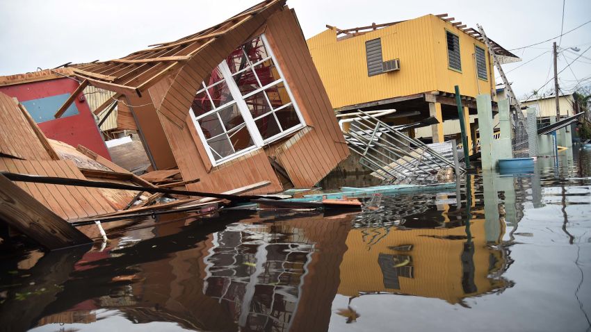 A destroyed house lays flooded in Catano town, in Juana Matos, Puerto Rico, on September 21, 2017.
Puerto Rico braced for potentially calamitous flash flooding after being pummeled by Hurricane Maria which devastated the island and knocked out the entire electricity grid. The hurricane, which Puerto Rico Governor Ricardo Rossello called "the most devastating storm in a century," had battered the island of 3.4 million people after roaring ashore early Wednesday with deadly winds and heavy rain.
 / AFP PHOTO / HECTOR RETAMAL        (Photo credit should read HECTOR RETAMAL/AFP/Getty Images)