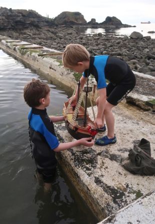 The boys tested it with a counter weight and polystyrene in water before setting sail.