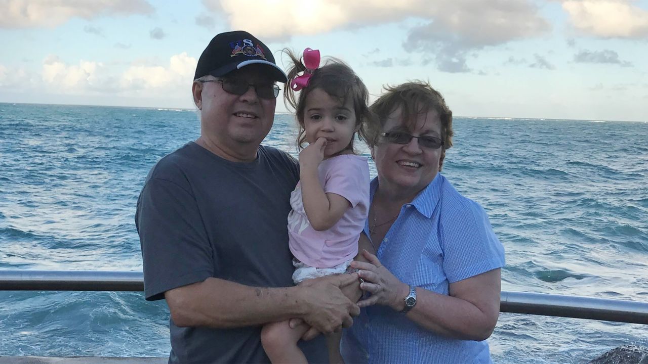 Gretchen Lopez is searching for her family in Puerto Rico. Pictured are her parents, with Gretchen's daughter.