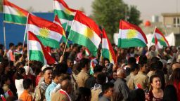 Iranian Kurds hold Kurdish flags as they take part in a gathering to urge people to vote in the upcoming independence referendum in the town of Bahirka, north of Arbil, the capital of the autonomous Kurdish region of northern Iraq, on September 21, 2017.
The controversial referendum on independence for Iraqi Kurdistan is set for September 25. / AFP PHOTO / SAFIN HAMED        (Photo credit should read SAFIN HAMED/AFP/Getty Images)