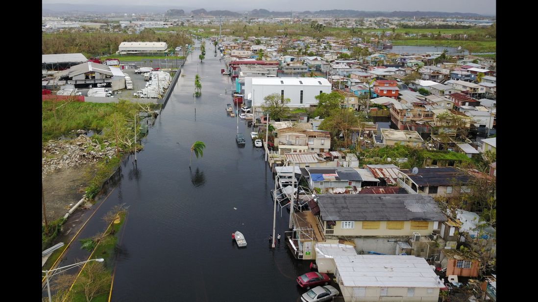 An aerial view shows a flooded neighborhood in Catano, Puerto Rico, on Friday, September 22. 