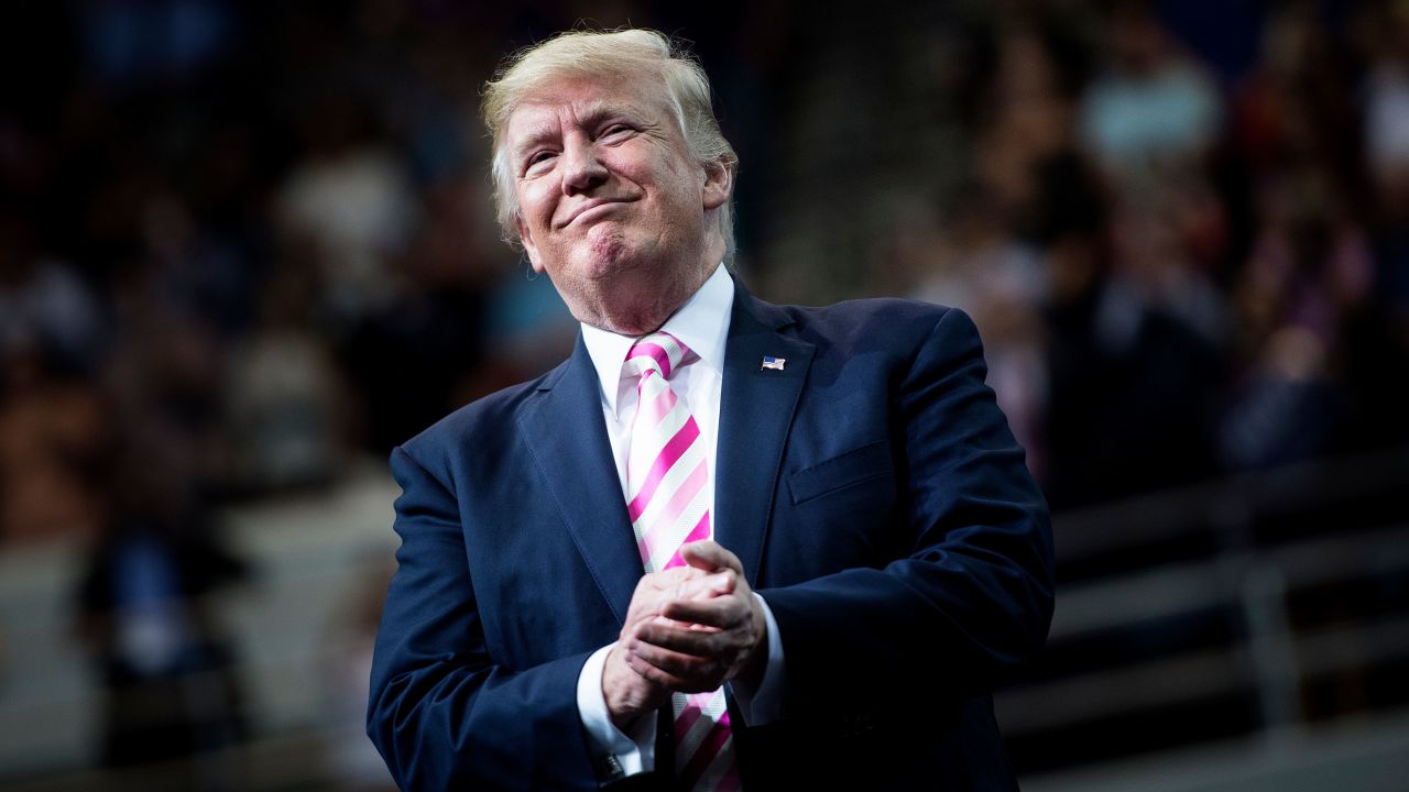 US President Donald Trump applauds during a rally for Sen. Luther Strange (R-AL) at the Von Braun Civic Center September 22, 2017 in Huntsville, Alabama. (BRENDAN SMIALOWSKI/AFP/Getty Images)