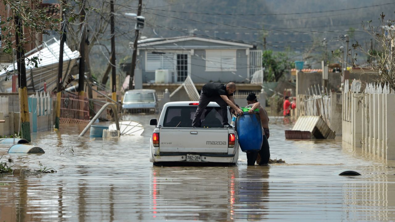Residents evacuate after the passing of Hurricane Maria in Puerto Rico.
