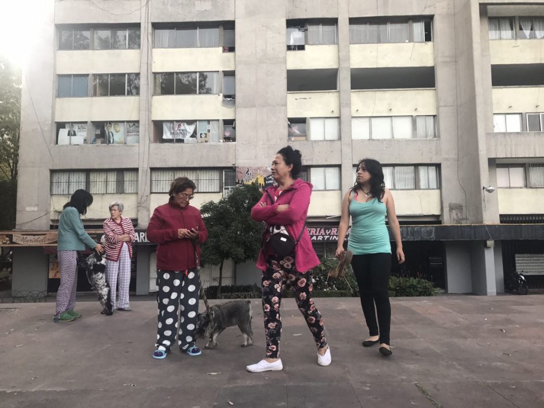 People evacuate buildings in Mexico City's Tlatelolco area after a seismic alert sounded Saturday. 