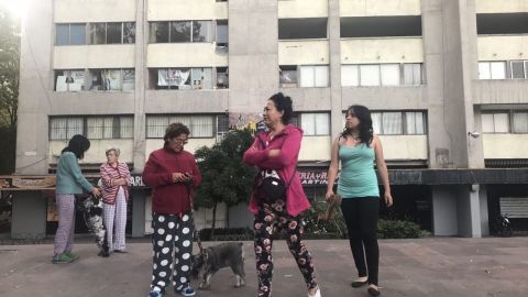People evacuate buildings in Mexico City's Tlatelolco area after a seismic alert sounded Saturday. 