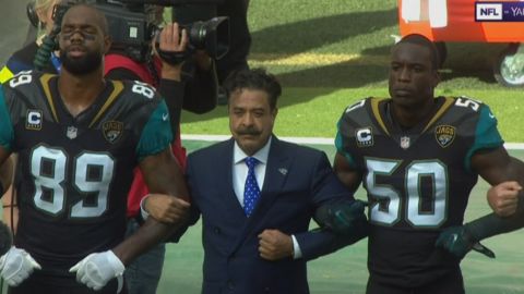 Team owner Shad Khan joined his players in protest Sunday. 