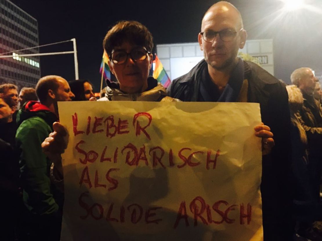 Couple Elgin and Friedhelm from Berlin rushed out to attend the protest after watching the results at home.