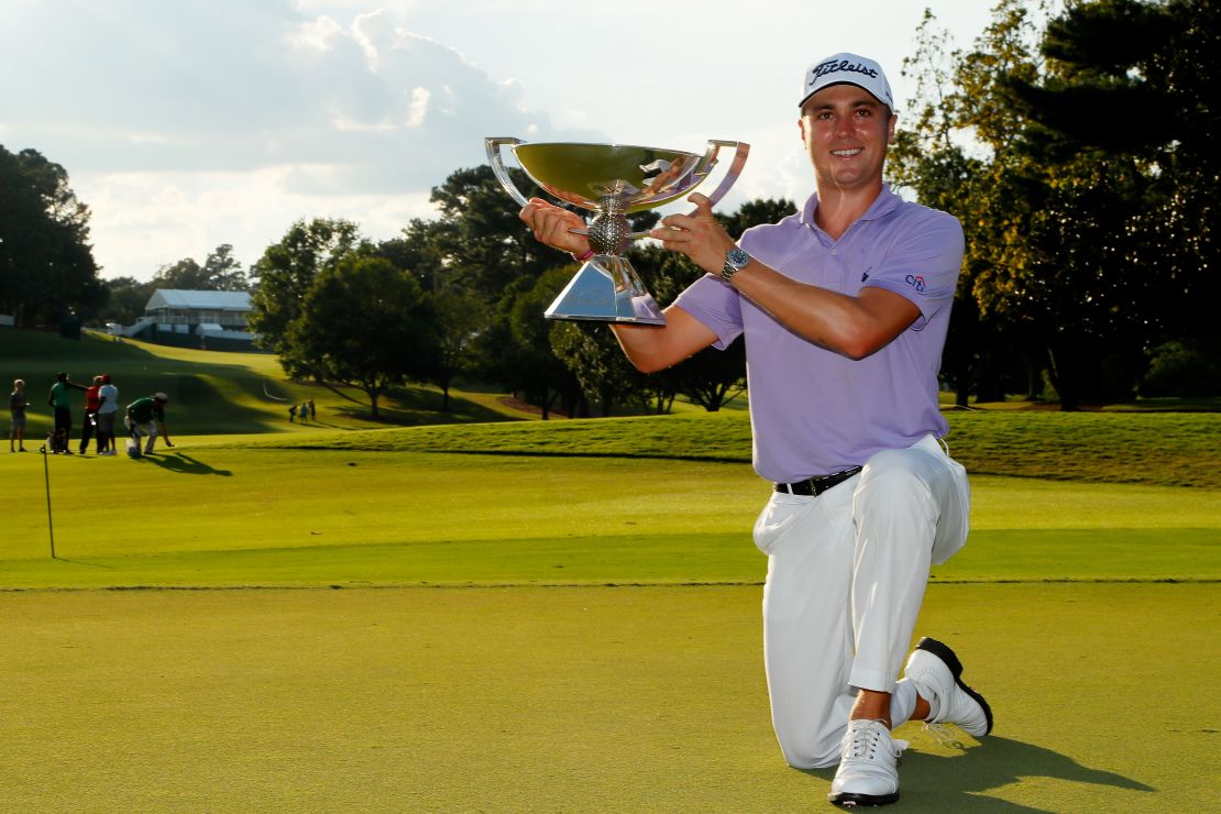 Justin Thomas of the United States poses after winning the 2017 FedExCup.