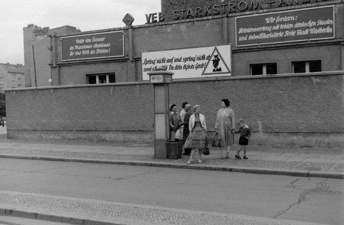 <strong>Communist propaganda, East Berlin, August 1, 1960</strong>: Hailstone's photographs capture people, places and moments now lost in time. "I don't tend to notice how people are dressed," says Hailstone. "But they looked a bit unhappy, a bit depressed, the people in the East, it was a bit shabbier, there was a very different contrast from the West."