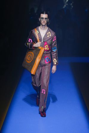 Elton John played a pivotal role in this season's Gucci show. A selection of the garments, like this two-piece suit with embroidered musical notes, were directly inspired by the hit-maker's archive.