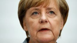 German Chancellor Angela Merkel gives a press conference at the headquarters of the Christian Democratic Union (CDU) party in Berlin on September 25, 2017, one day after general elections.Merkel woke up to a fourth term but now faces the double headache of an emboldened hard-right opposition party and thorny coalition talks ahead. / AFP PHOTO / Odd ANDERSEN        (Photo credit should read ODD ANDERSEN/AFP/Getty Images)