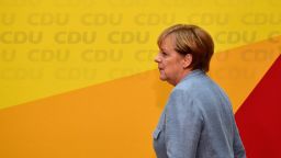 German Chancellor Angela Merkel arrives to give a press conference at the headquarters of the Christian Democratic Union (CDU) party in Berlin on September 25, 2017, one day after general elections.Merkel woke up to a fourth term but now faces the double headache of an emboldened hard-right opposition party and thorny coalition talks ahead. / AFP PHOTO / Tobias SCHWARZ        (Photo credit should read TOBIAS SCHWARZ/AFP/Getty Images)