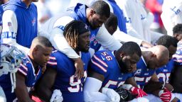ORCHARD PARK, NY - SEPTEMBER 24:  Buffalo Bills players kneel during the American National anthem before an NFL game against the Denver Broncos on September 24, 2017 at New Era Field in Orchard Park, New York.  (Photo by Brett Carlsen/Getty Images)