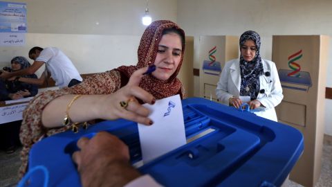 An Iraqi Kurdish woman casts her vote in Irbil on Monday.
