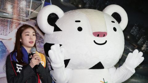 Former Olympic figure skater Yuna Kim introduces Winter Olympics mascot Soohorang the white tiger.