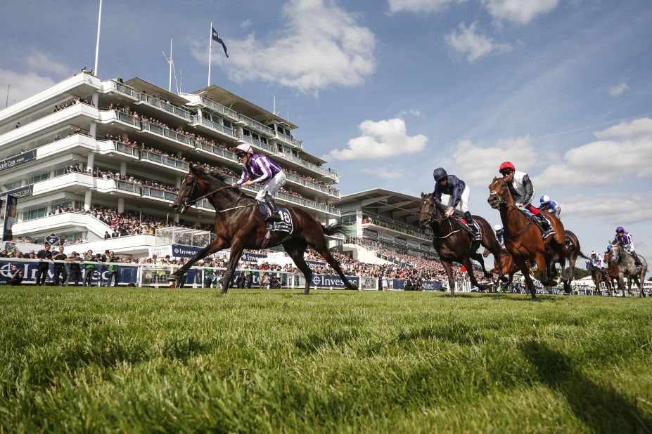 Irish jockey Padraig Beggy rode trainer Aidan O'Brien's huge outsider Wings Of Eagles (left) to victory in the Derby, finishing ahead of Cliffs Of Moher (center).