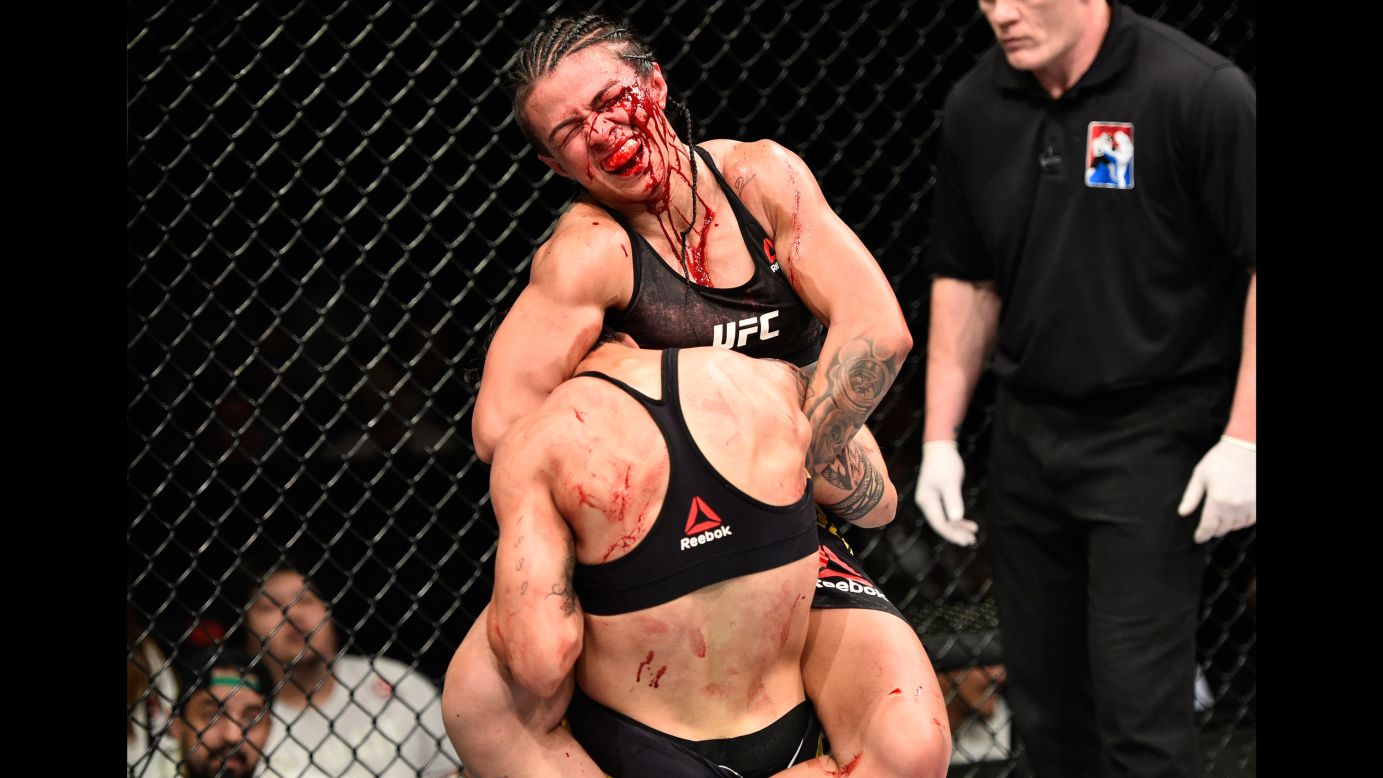 Claudia Gadelha tries to force Jessica Andrade to submit during their UFC bout in Saitama, Japan, on Friday, September 22. Andrade won a unanimous decision in what was named the Fight of the Night.