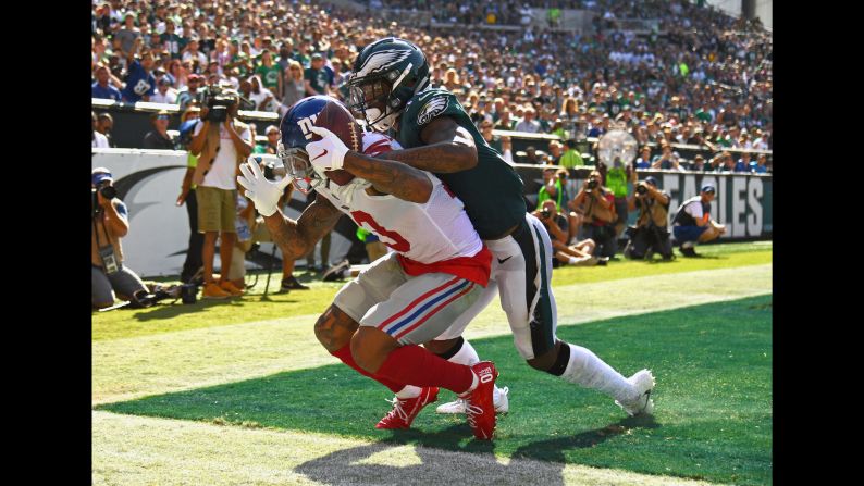 Odell Beckham Jr. catches a fourth-quarter touchdown pass during an NFL game in Philadelphia on Sunday, September 24. Beckham had two touchdowns in the game, but Philadelphia won 27-24 when Jake Elliott kicked a 61-yard field goal as time expired.