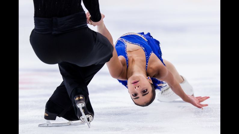 Canadian figure skater Chloe Panetta is held by her partner, Steven Lapointe, during a Junior Grand Prix event in Minsk, Belarus, on Friday, September 22.