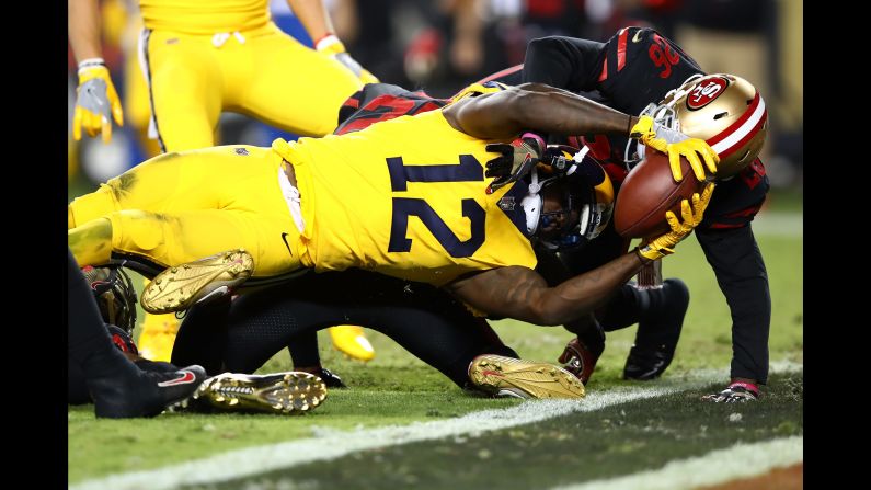 Los Angeles Rams wide receiver Sammy Watkins stretches the ball across the goal line during an NFL game at San Francisco on Thursday, September 21. Watkins scored twice in the Rams' 41-39 victory.