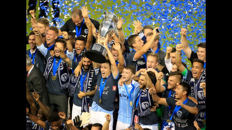 Sporting Kansas City captain Matt Besler hoists the US Open Cup after the Major League Soccer team won the tournament final on Wednesday, September 20. Sporting has won three Open Cups since 2012.