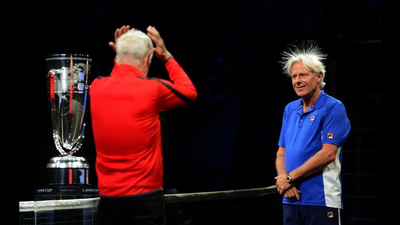 Tennis legends John McEnroe, left, and Bjorn Borg share a lighthearted moment about Borg's hair at the start of the Laver Cup on Friday, September 22. McEnroe was the captain for Team World, while Borg captained Team Europe.
