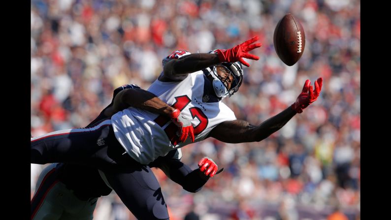 Houston wide receiver Bruce Ellington pulls in a pass during an NFL game at New England on Sunday, September 24.