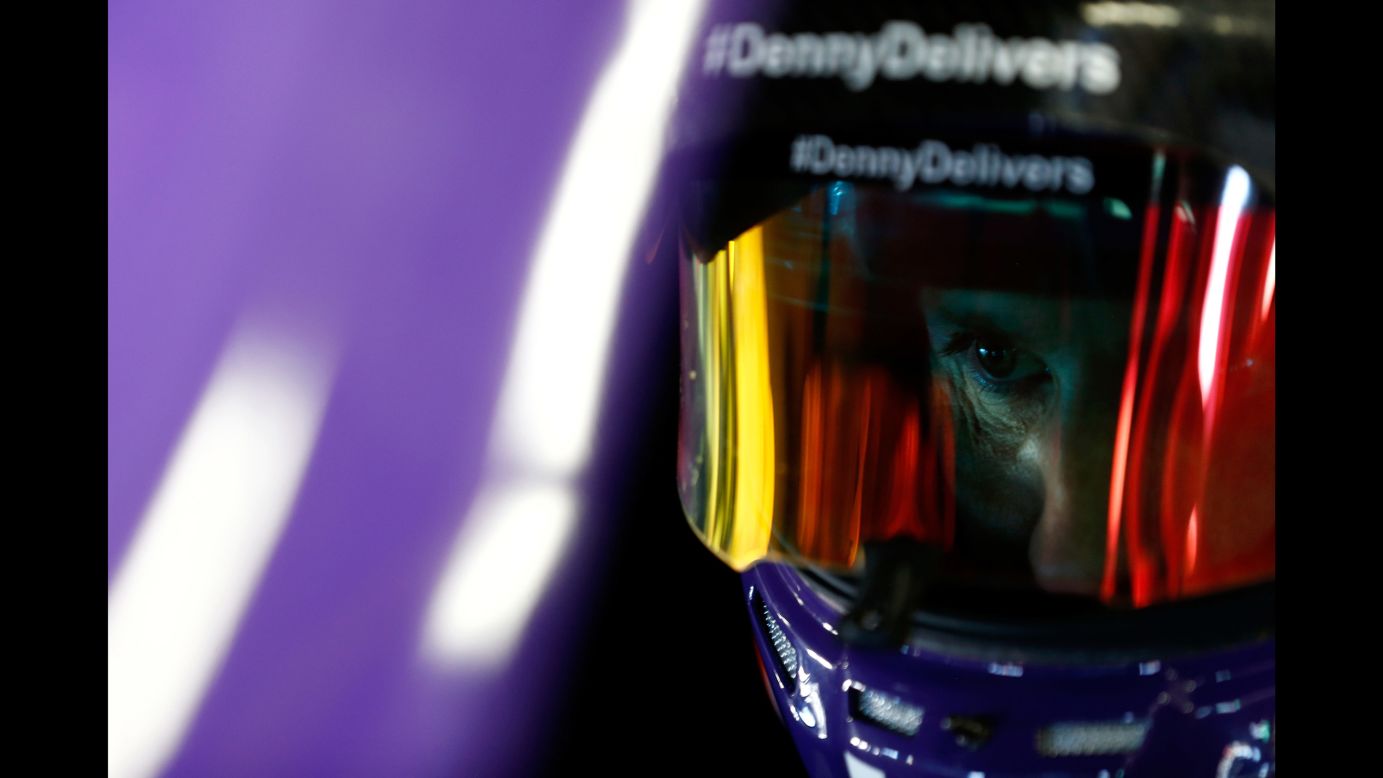NASCAR driver Denny Hamlin sits in his car during practice in Loudon, New Hampshire, on Saturday, September 23.