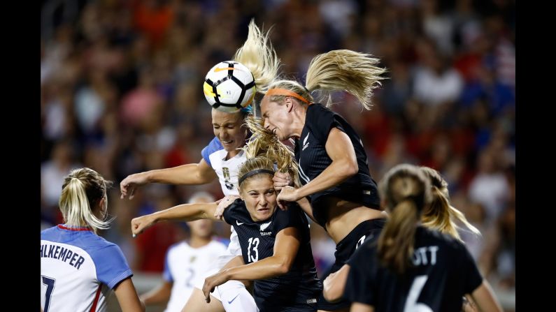New Zealand's Kirsty Yallop, top right, goes for a header next to the United States' Julie Ertz during an international friendly on Tuesday, September 19. The United States won 5-0 in Cincinnati.