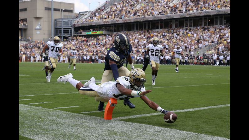 Georgia Tech quarterback TaQuon Marshall dives into the end zone during a home game against Pittsburgh on Saturday, September 23. Marshall had two rushing touchdowns as Georgia Tech won its ACC opener 35-17.