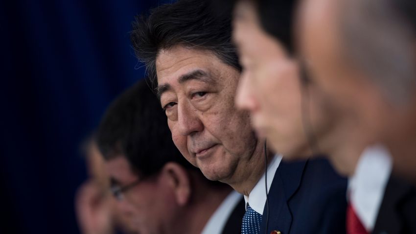 Japan's Prime Minister Shinzo Abe listens to a statement before luncheon with US, Korean, and Japanese leaders at the Palace Hotel during the 72nd United Nations General Assembly on September 21, 2017 in New York City. / AFP PHOTO / Brendan Smialowski        (Photo credit should read BRENDAN SMIALOWSKI/AFP/Getty Images)