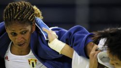 Cuba's Driulis Gonzalez (L) and Chinese Taipei Chin-Fang Wang compete during their women's -63kg judo match of the 2008 Beijing Olympic Games on August 12, 2008 in Beijing.     AFP PHOTO / OLIVIER MORIN (Photo credit should read OLIVIER MORIN/AFP/Getty Images)