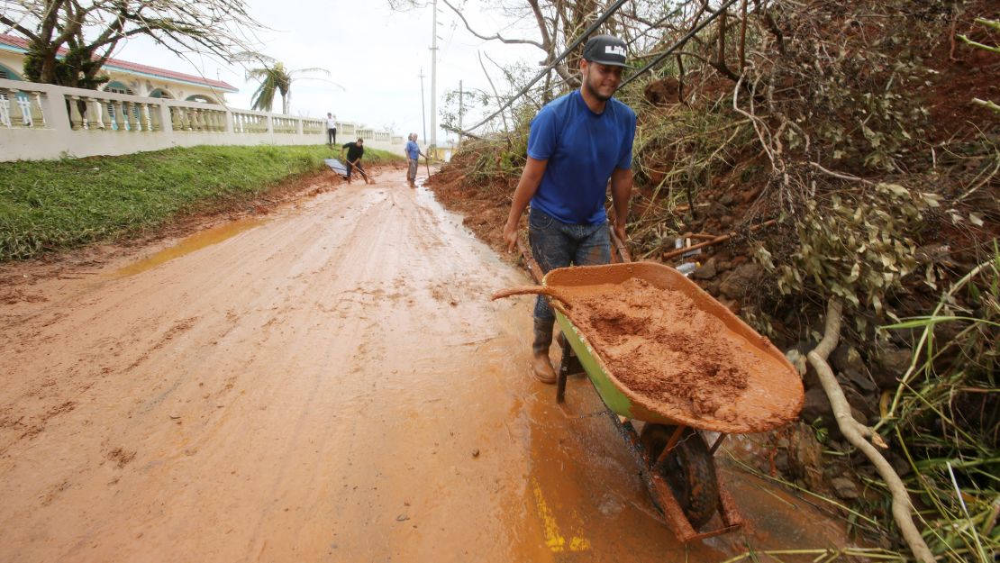 Residents in Quebradillas are trying to begin cleanup on their own. 