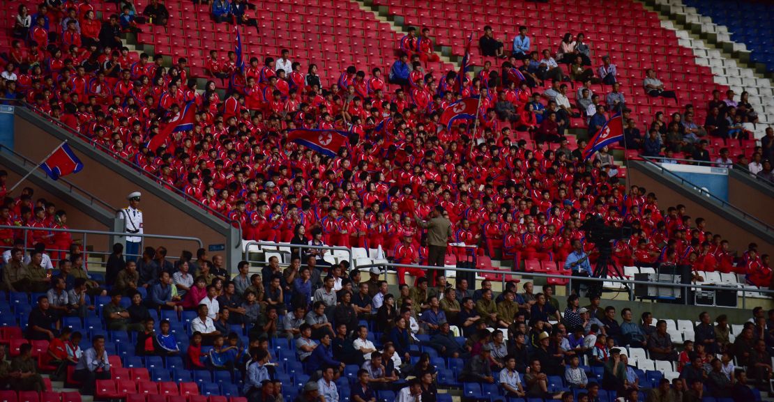 April 25 fans watch their team dressed in North Korean colors.