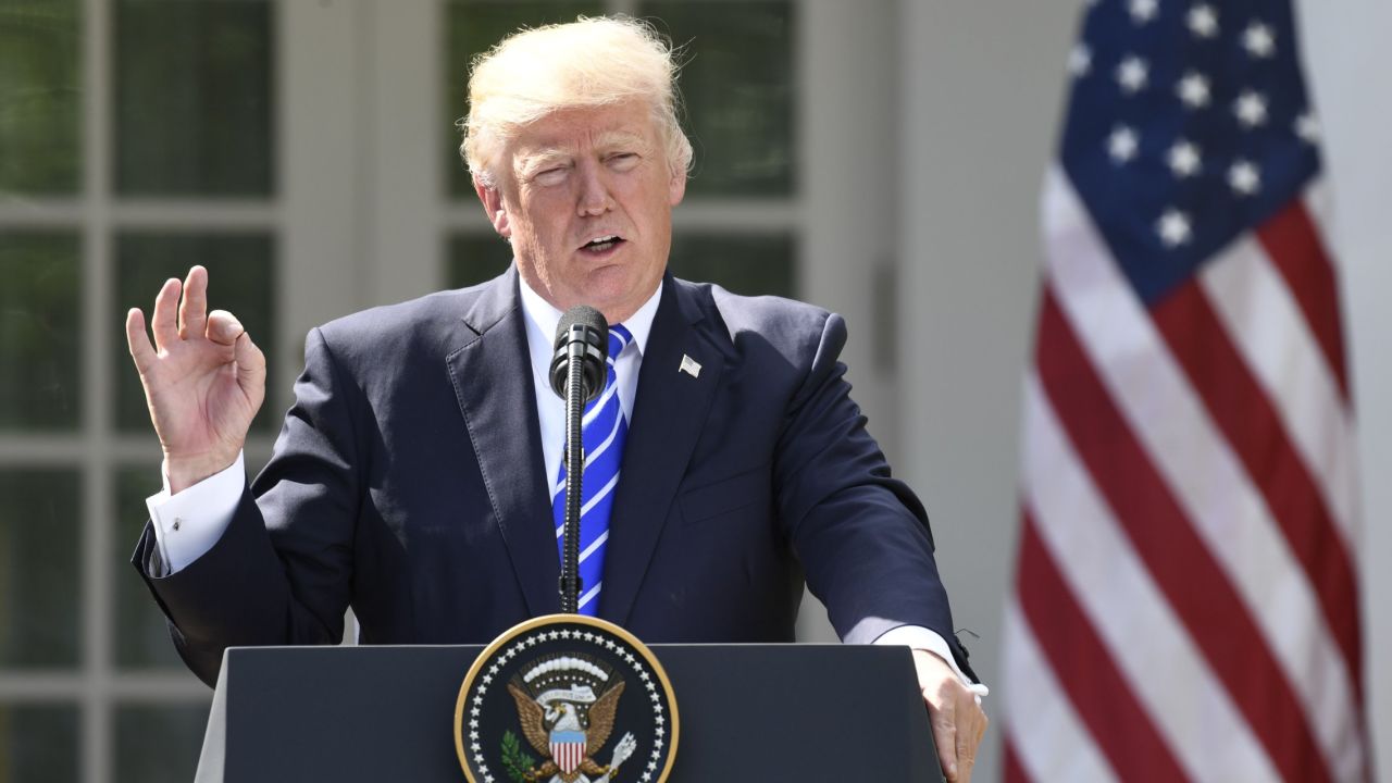 US President Donald Trump holds a joint press conference with Spanish Prime Minister Mariano Rajoy in the Rose Garden of the White House in Washington, DC, September 26, 2017.