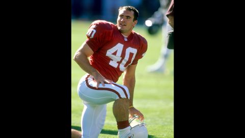 Arizona Cardinals safety Tillman smiles during pregame warm-ups in Tempe, Arizona, in 2000.