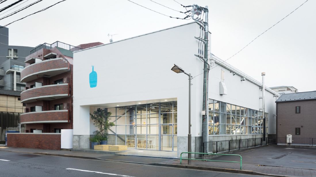 Blue Bottle Coffee's former Japanese head office was a  derelict warehouse before Schemata Architects converted it into a versatile workspace. 