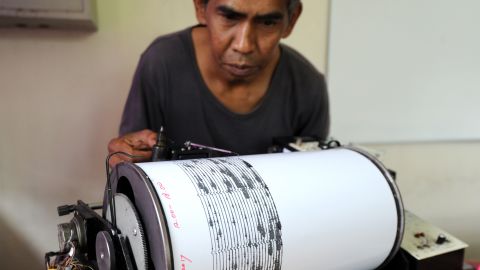 A man monitors seismic waves at the Mount Agung monitoring station in Karangasem, September 23.