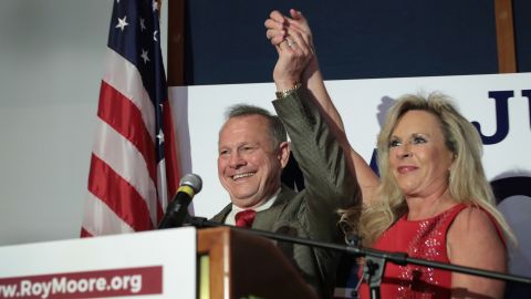 MONTGOMERY, AL - SEPTEMBER 26: Republican candidate for the U.S. Senate in Alabama, Roy Moore and his wife Kayla greet supporters at an election-night rally on September 26, 2017 in Montgomery, Alabama. Moore, former chief justice of the Alabama supreme court, defeated incumbent Luther Strange in a primary runoff election for the seat vacated when Jeff Sessions was appointed U.S. Attorney General by President Donald Trump. Moore will now face Democratic candidate Doug Jones in the general election in December. (Photo by Scott Olson/Getty Images)