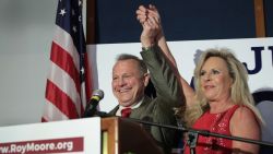 MONTGOMERY, AL - SEPTEMBER 26:  Republican candidate for the U.S. Senate in Alabama, Roy Moore and his wife Kayla greet supporters at an election-night rally on September 26, 2017 in Montgomery, Alabama. Moore, former chief justice of the Alabama supreme court, defeated incumbent Luther Strange in a primary runoff election for the seat vacated when Jeff Sessions was appointed U.S. Attorney General by President Donald Trump. Moore will now face Democratic candidate Doug Jones in the general election in December.  (Photo by Scott Olson/Getty Images)